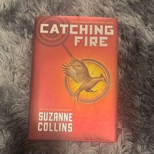 Catching Fire by Suzanne Collins - Red Cover